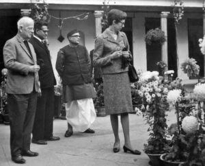 Dr. W Norman Brown, Mr. V.R. Nambiar and Mr. Jain with a visitor (L to R) at the American Academy of Benares, Rewa Palace, Varanasi, Uttar Pradesh, December, 1968.